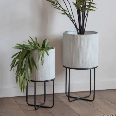 Cylindrical Shaped White Planter on Industrial Black Metal Stand Set of 2